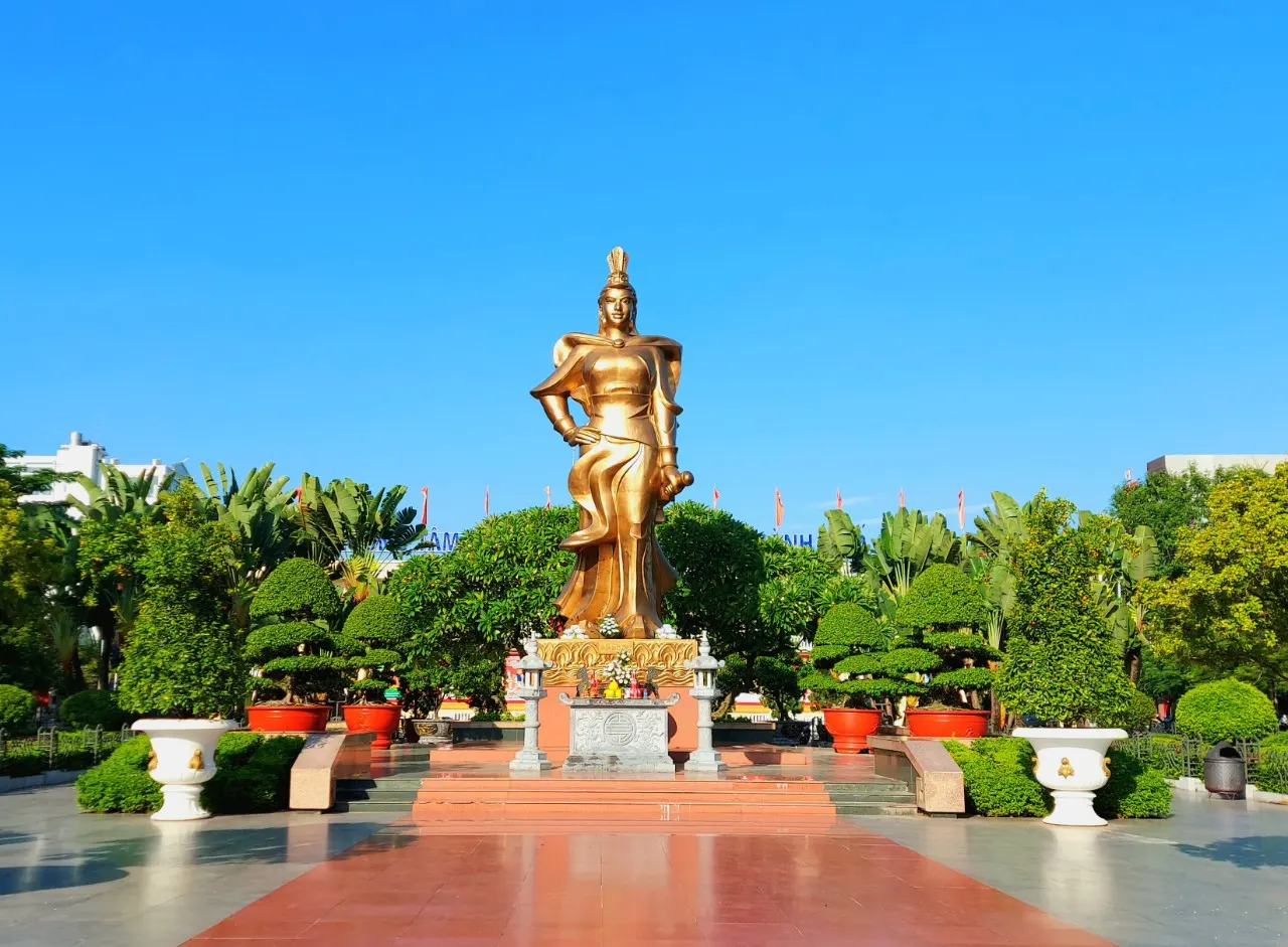 The statue of General Le Chan stands above an altar in a landscaped plaza in Hai Phong.